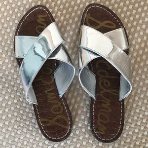 Sam Edelman metallic silver cross cross slides.